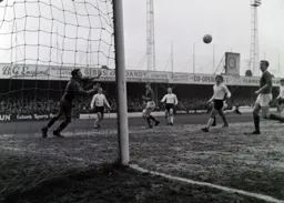 Ray Whittaker and future Town manager Ray Harford watch as the ball drifts wide of the goal