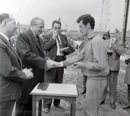 Max Dougan accepts his medal