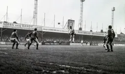 Alan Slough sends a header towards the goal