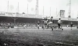 Laurie Sheffield can only watch as Alan King heads the ball clear for Rovers