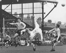 Terry Branston battles with the Watford forwards