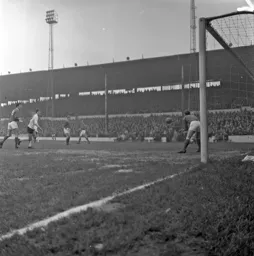The Swindon goalkeper safely gathers the ball