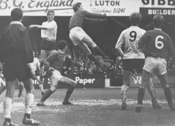 Terry Branston goes up for a corner