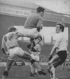 Keith Allen challenges the City goalkeeper