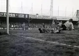 Ian Buxton and Alan Ogley go in bravely for the ball