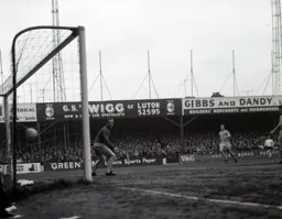 Mike Walker is beaten as Ian Buxton`s shot opens the scoring