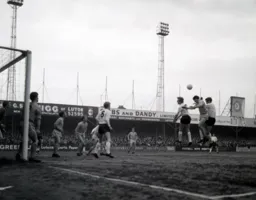 Keith Allen and Bruce Rioch bring pressure on the Watford goal