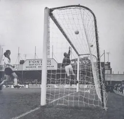Malcolm Macdonald watches his header pushed over the bar