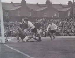 John Collins heads in