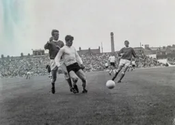 Malcolm Macdonald gathers the ball