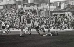 John Collins wheels away after scoring