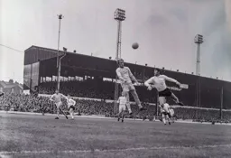 Malcolm Macdonald heads for goal