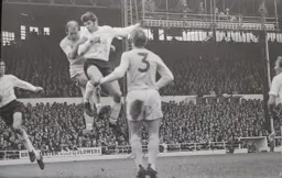 Malcolm Macdonald rises high to head towards goal