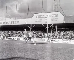 Malcolm Macdonald beats his marker