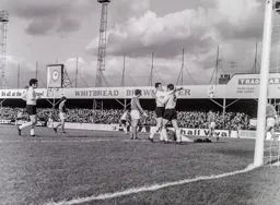 Malcolm Macdonald receives congratulations after scoring the opener in first six minutes