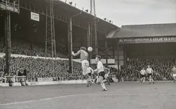 Malcolm Macdonald beaten to the ball this time