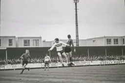 John Collins watches a Macdonald header go wide