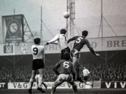 Malcolm Macdonald gets above the defence