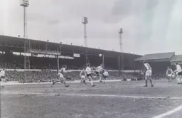 Mike Keen gets his head to the ball