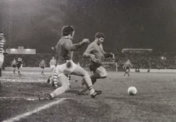 Malcolm Macdonald tries to round the keeper