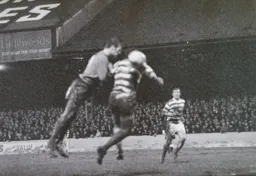 Matt Tees gets to the ball with his head