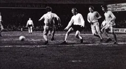 John Collins passes through to a teammate