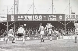 Malcolm Macdonald heads for goal