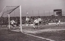 Malcolm Macdonald heads for goal