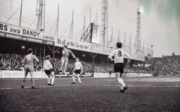 Walsall defender heads away