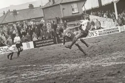 Malcolm Macdonald takes a hit
