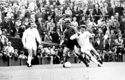 Viv Busby attempts to battle his way through