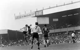 Roger Hoy wins an aerial duel