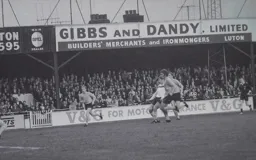 Malcolm Macdonald looks to score