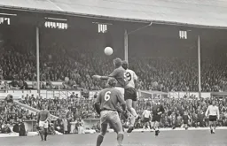 Malcolm Macdonald duels in the air