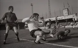 Malcolm Macdonald goes close, taken by a different camera