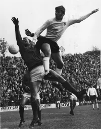 Malcolm Macdonald sees his header go wide