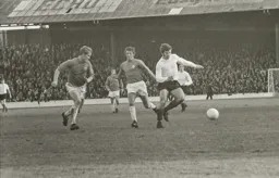 Malcolm Macdonald gets close attention.