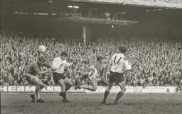 Malcolm Macdonald gets his header in