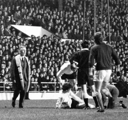 Jimmy Ryan receives treatment after being fouled