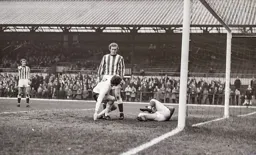 Don Givens get the evils after challenging the keeper