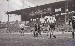 Malcolm Macdonald heads for goal in front of the TV cameras