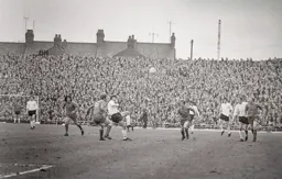Malcolm Macdonald plays the ball down the wing