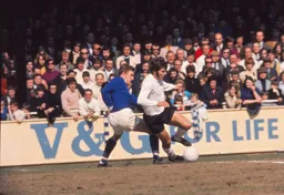 Malcolm Macdonald tries to go past Leicester's John Sjoberg