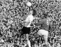 Viv Busby wins his header