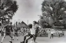 Viv Busby challenged from behind