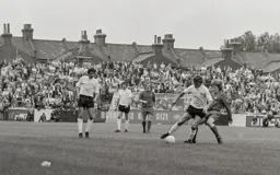 Viv Busby turns his opponent