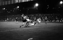 Mike Keen stretches in defence