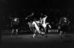 Chris Nicholl heads clear