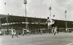Vic Halom challenges Birmingham's centre half Roger Hynd