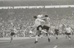 Vic Halom clashes with the Hull midfield